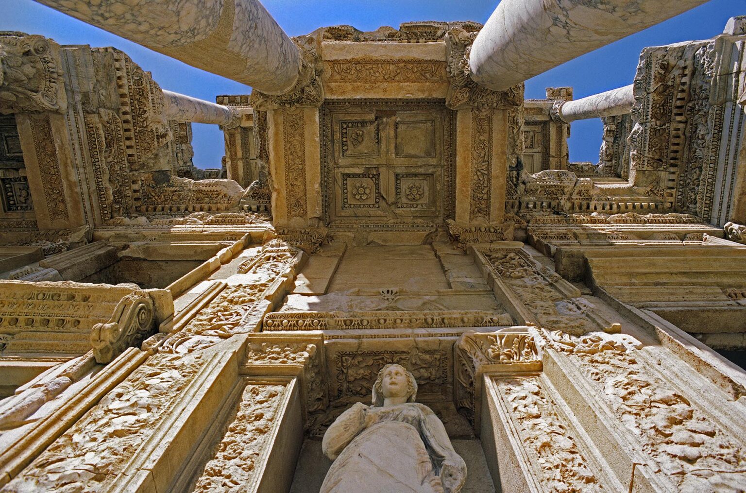Dramatic upward angle of the Library of Celsus at EHESUS (One of the world's largest Greek/Roman archeological sights) - Turkey