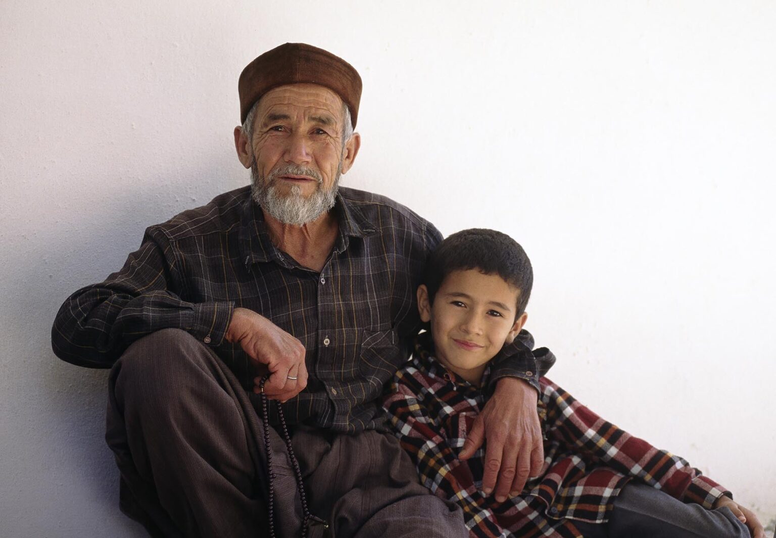 Grandfather and grandson in the village of BEZIRGAN - TURKEY