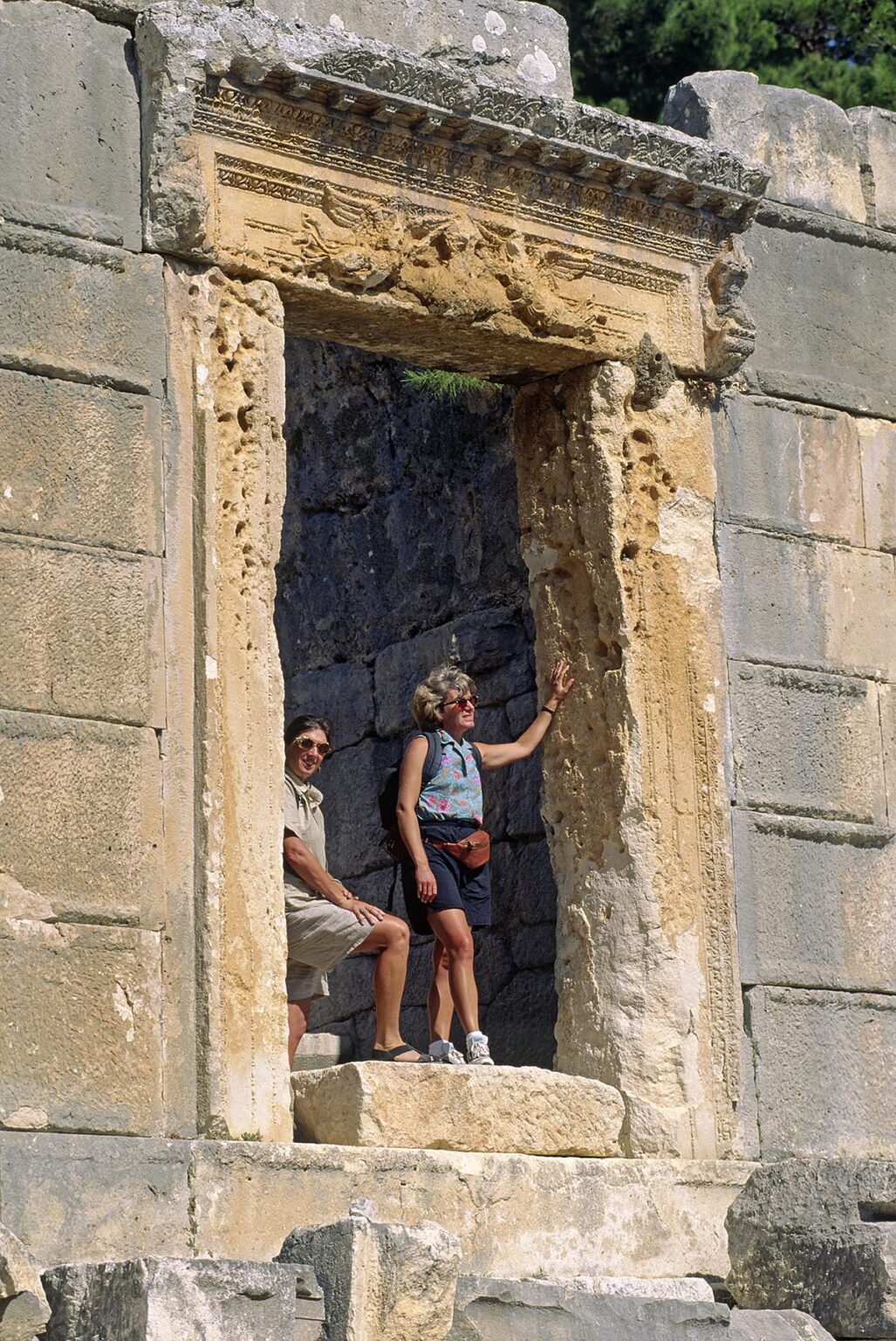 Catherine and Christine in a doorway at the ancient LYCIAN ruins of ARYKANDA (400 BC) - TURKEY