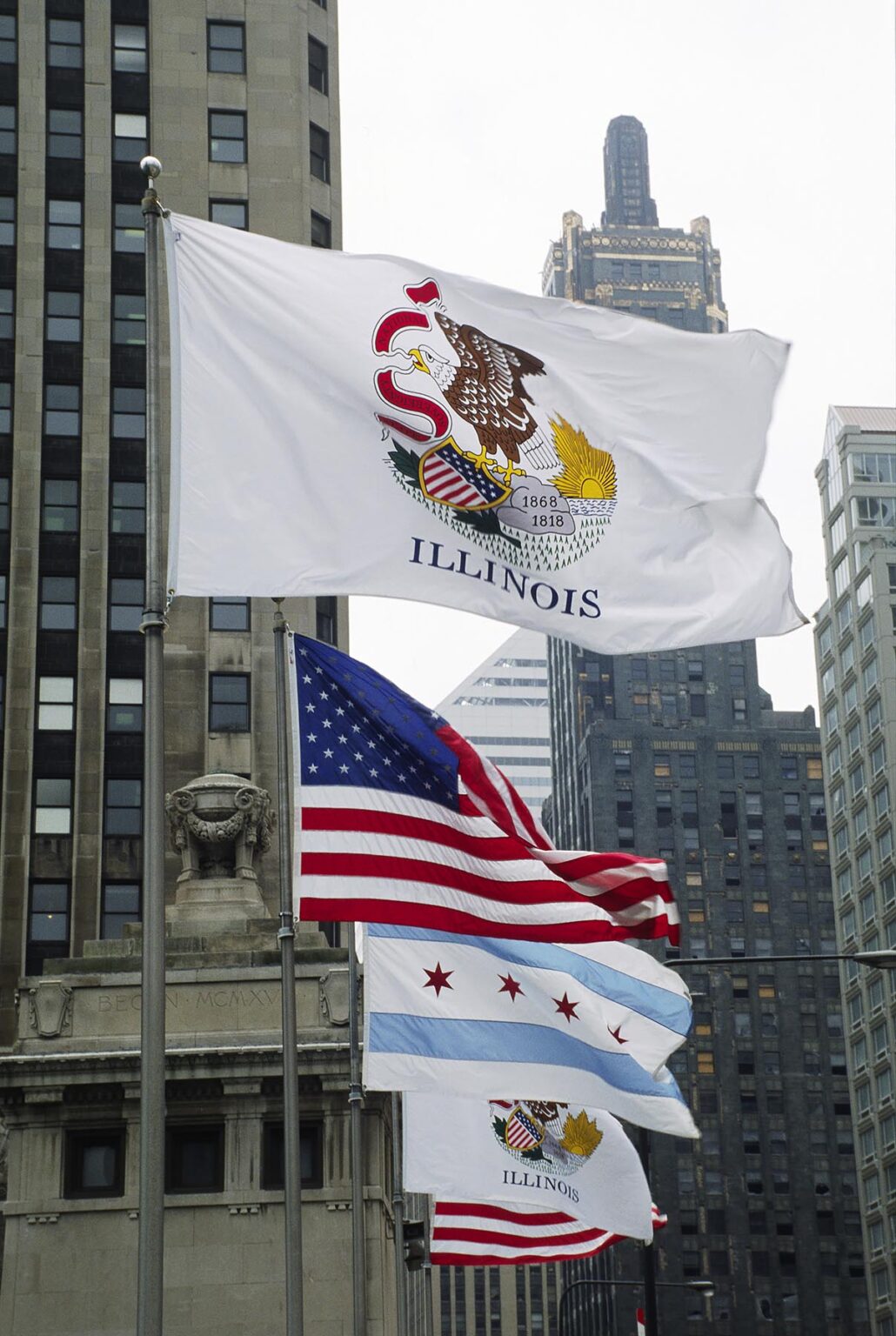 USA, ILLINOIS STATE, and CHICAGO FLAGS proudly fly on the MICHIGAN STREET BRIDGE - CHICAGO, ILLINOI