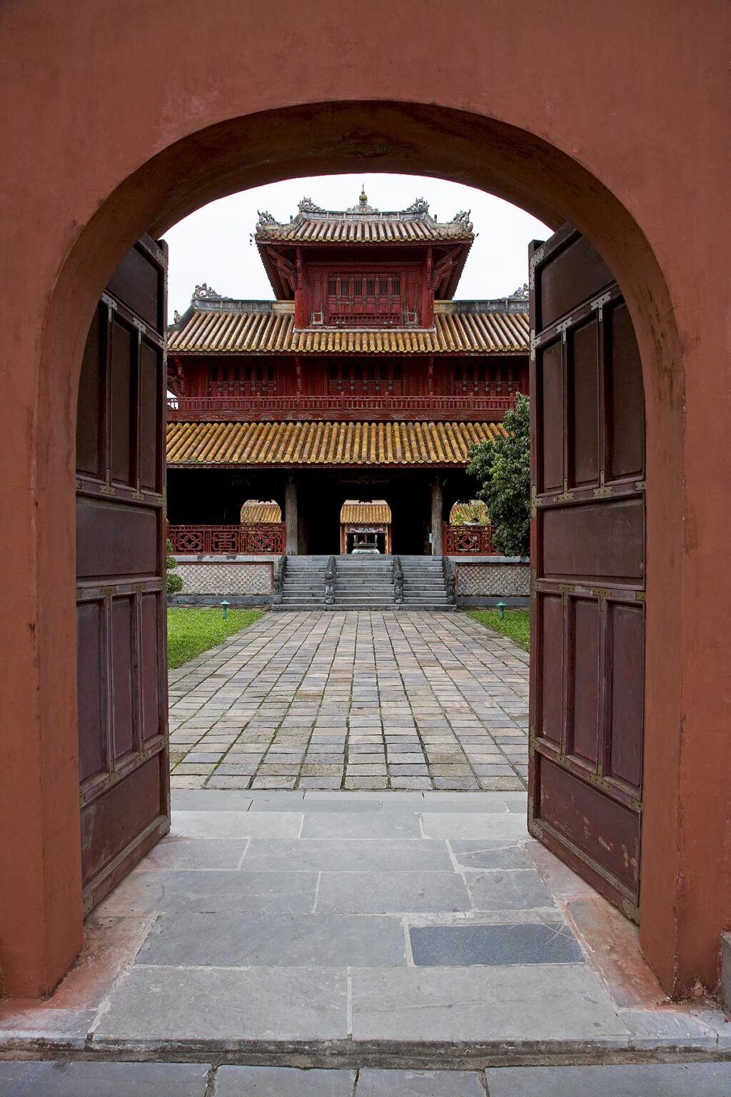 Large ARCHED DOORWAYS lead the way to the MIEU TEMPLE inside the IMPERIAL CITADEL - HUE. VIETNAM