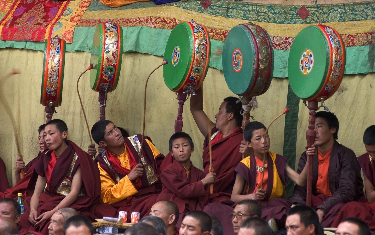 Nyingmapa monks play drums at the Monlam Chenmo dances, Katok Dorjeden Monastery - Kham, (Tibet), Sichuan, China