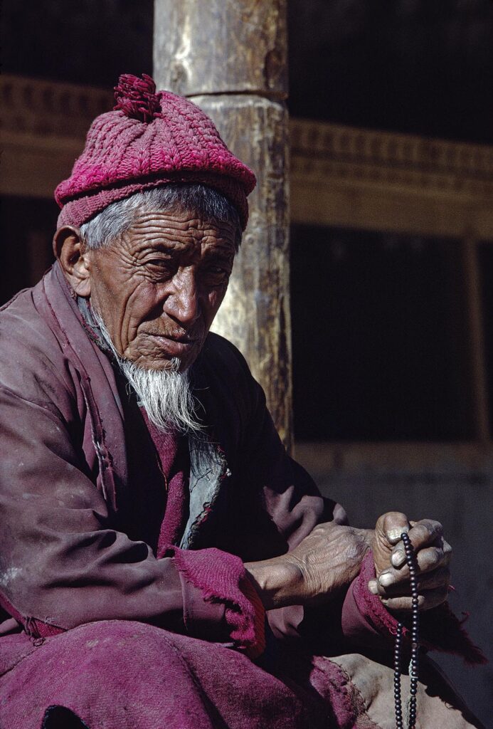 LAMA (MONK) with mala (ROSARY), HEMIS GOMPA (monastery) - LADAKH, INDIA