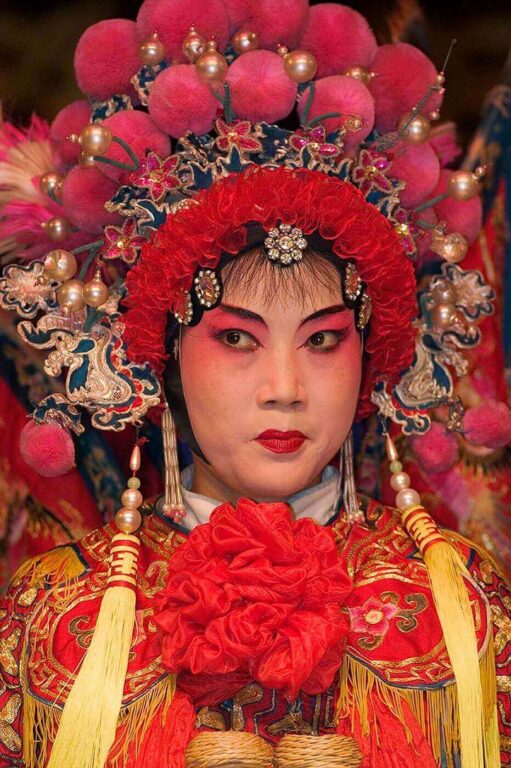 Female opera star with full headdress in a traditional Chinese Puppet Show - Chengdu, China in Sichuan Province