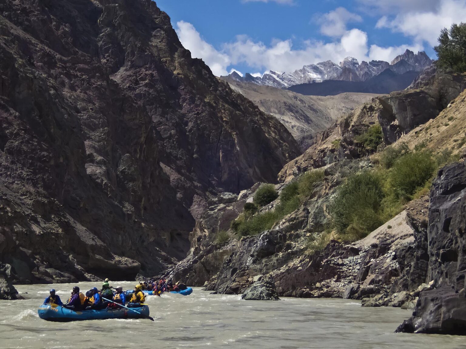 River rafting down the ZANSKAR RIVER GORGE considered the Grand Canyon of the Himalayas - ZANSKAR, LADAKH, INDIA