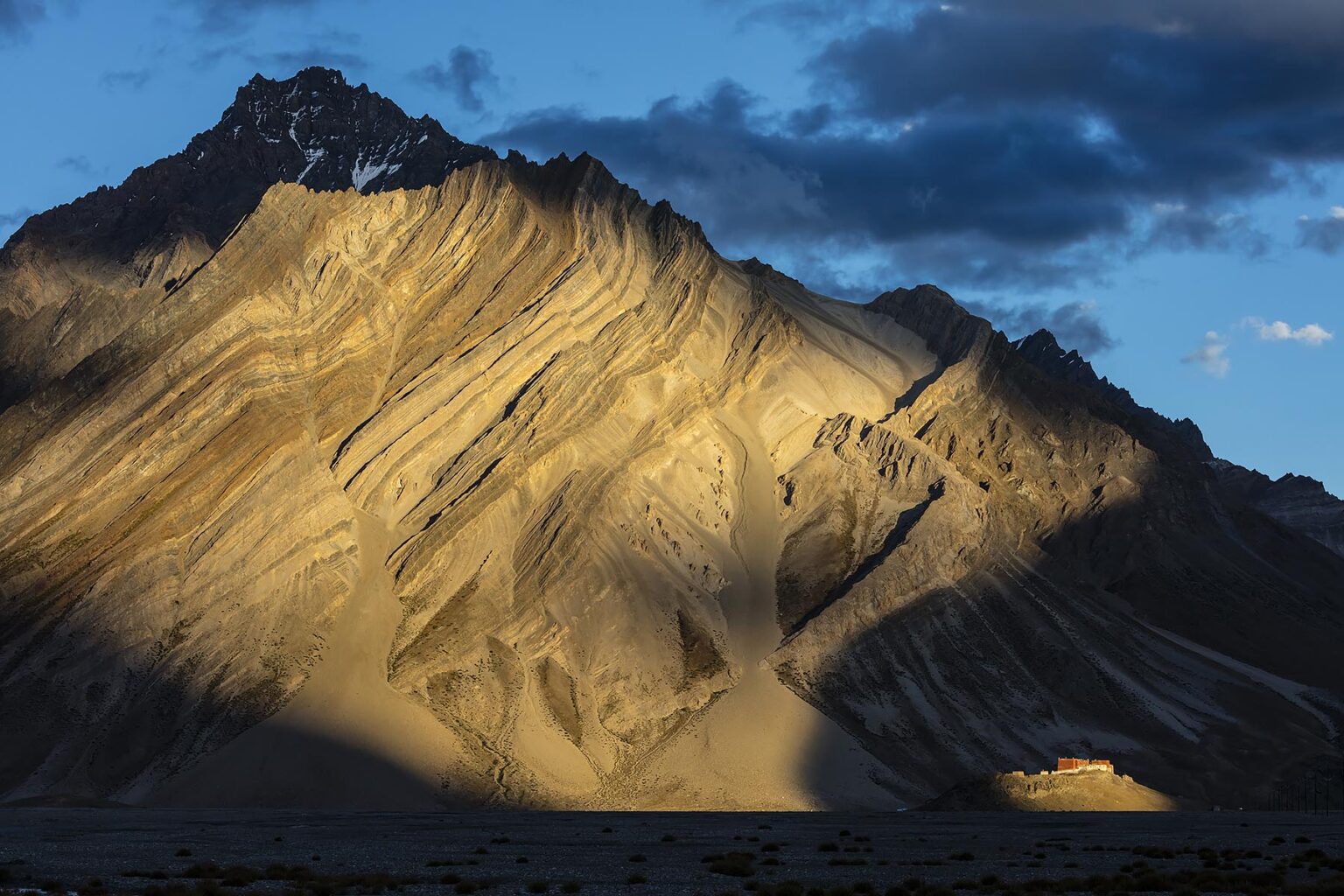 RANGDUM MONASTERY sits below Himalayan peaks in the Stod River Valley - ZANSKAR, LADAKH, INDIA