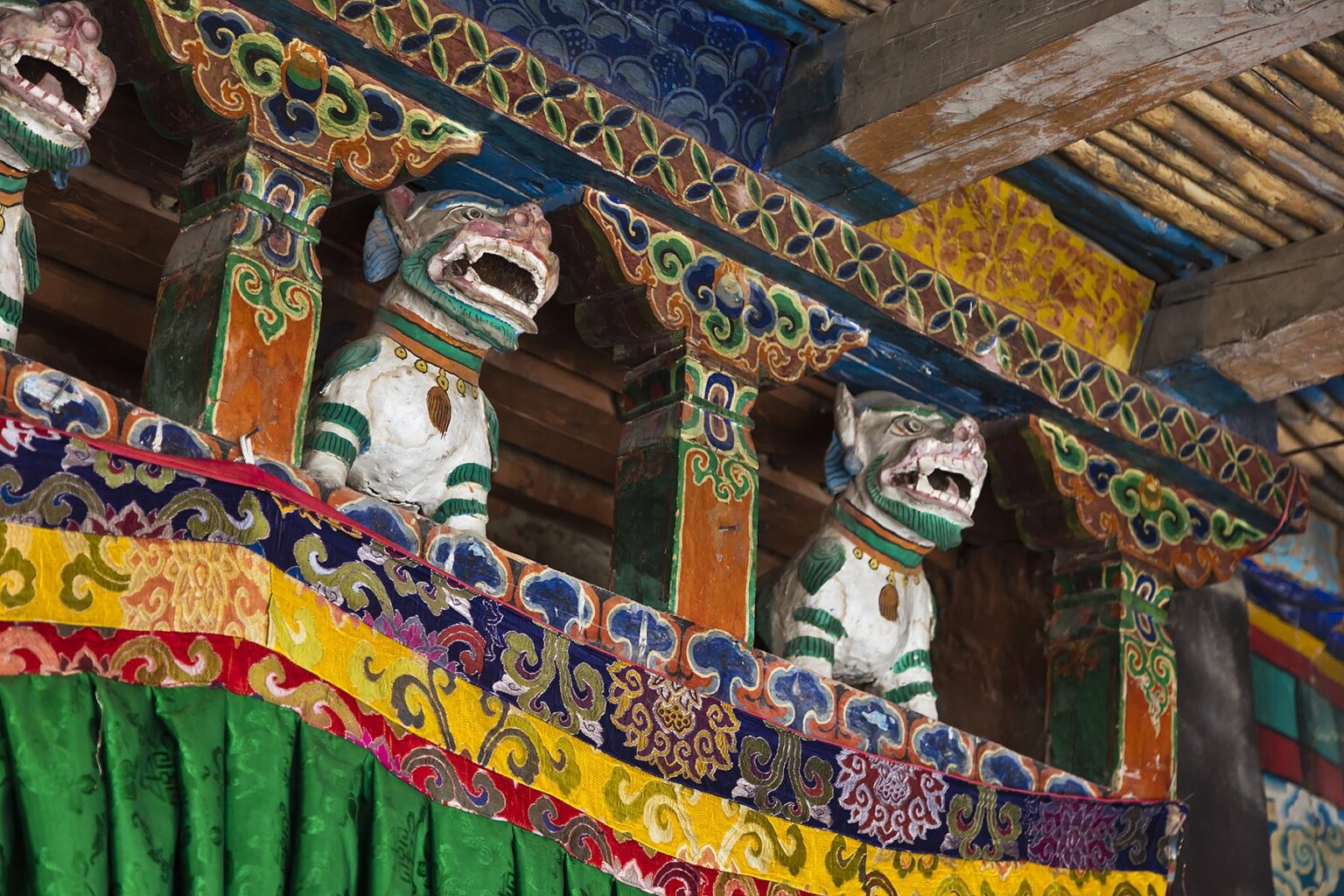 SNOW LIONS guard the entrance to a Buddhist chapel at the RANGDUM MONASTERY - ZANSKAR, LADAKH, INDIA