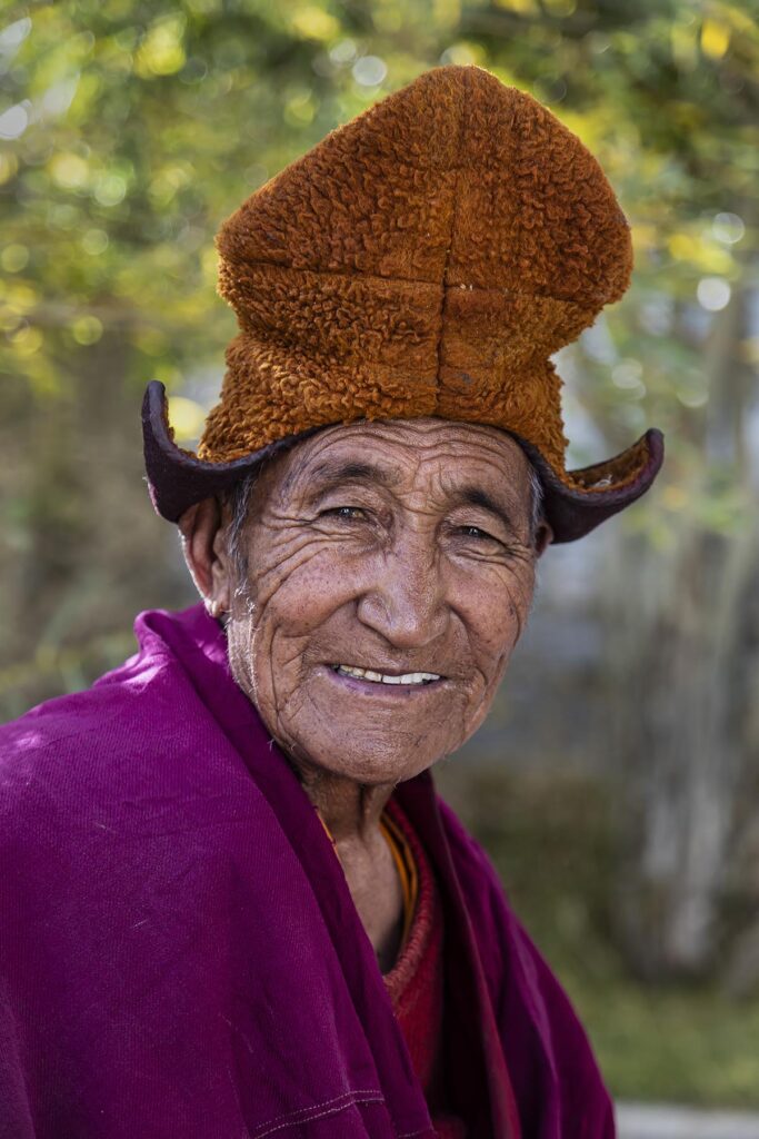 A BUDDHIST NUN at KARSHA GOMPA the largest Buddhist Monastery in the STOD RIVER VALLEY - ZANSKAR, LADAKH, INDIA