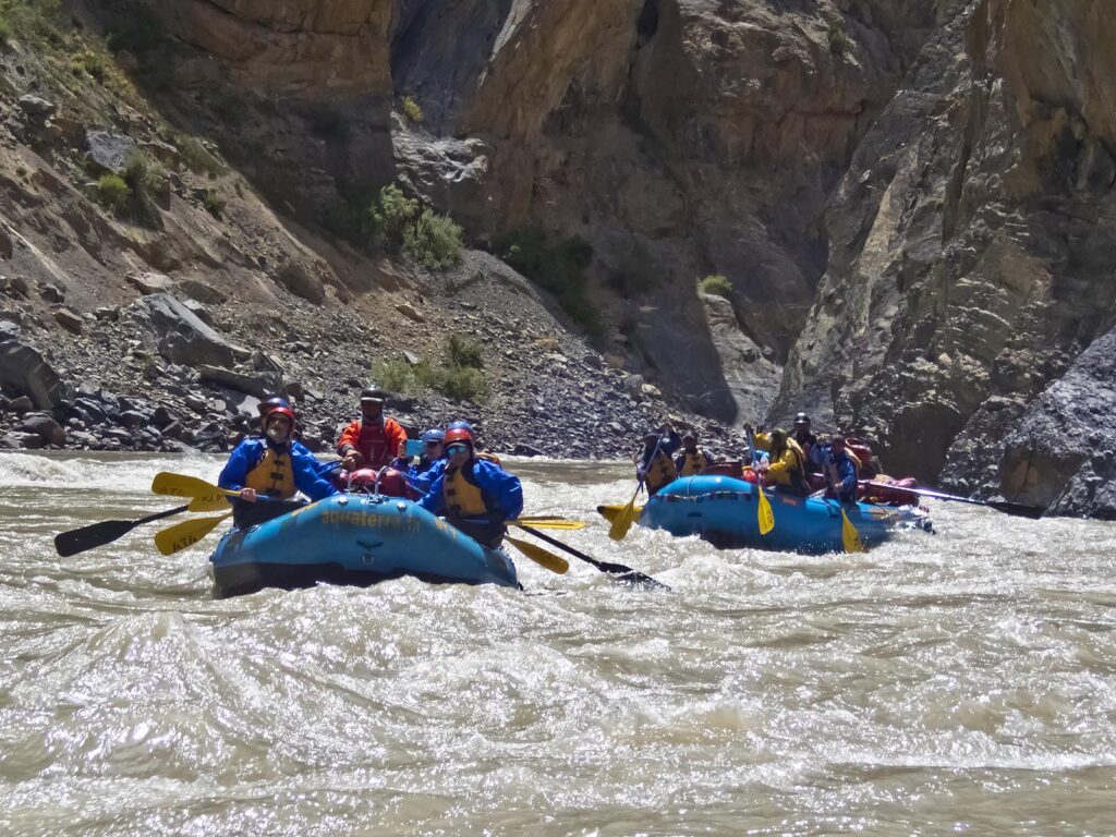 River rafting down the ZANSKAR RIVER GORGE considered the Grand Canyon of the Himalayas - ZANSKAR, LADAKH, INDIA