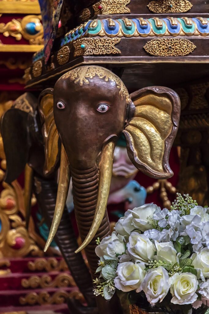 Altar detail of a carved elephant inside a chapel at HEMIS MONASTERY established in 1672 AD - LEH VALLEY, LADAKH