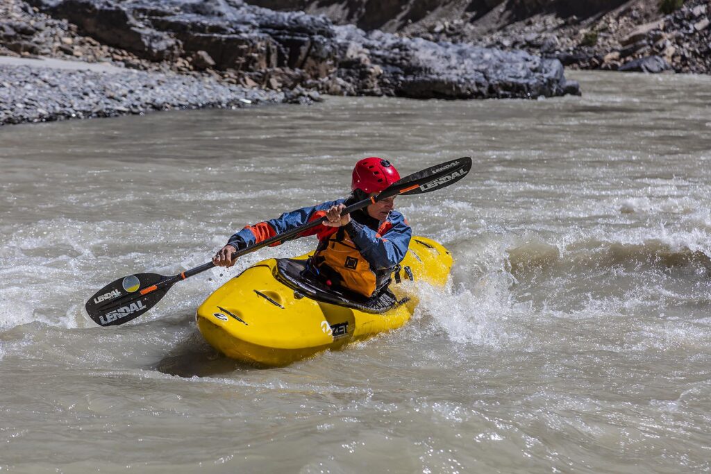 JOCK MONTGOMERY kayaking down the ZANSKAR RIVER GORGE considered the Grand Canyon of the Himalayas - ZANSKAR, LADAKH, INDIA
