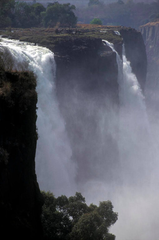 VICTORIA FALLS on the ZAMBEZI RIVER is AFRICA'S most spectacular waterfall & divides ZAMBIA & ZIMBABWE