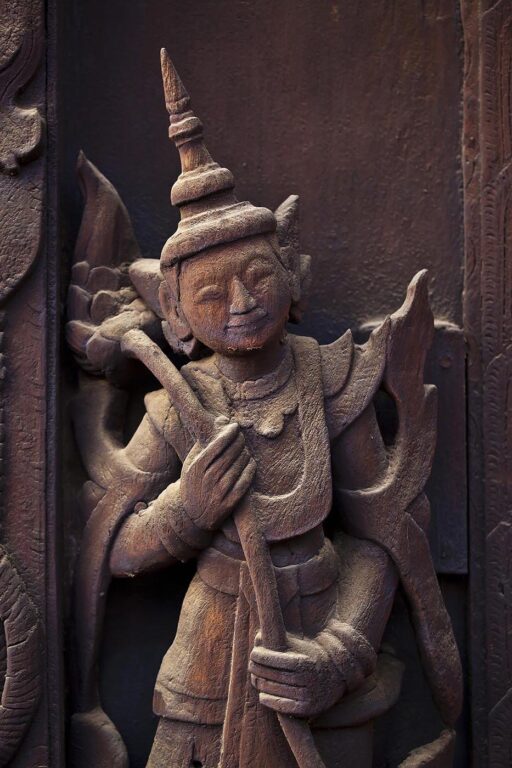 Elaborate carvings on the SHWE IN BIN KYAUNG known as the TEAK MONASTERY and built in 1895 - MANDALAY, MYANMAR
