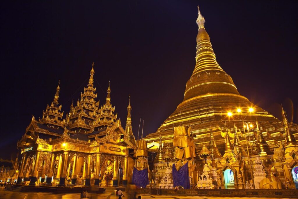 The main ZEDI of the SHWEDAGON PAYA or PAGODA which dates from 1485 is gilded every year - YANGON, MYANAMAR