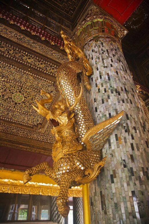 GLASS and GOLD DRAGON at the SHWEDAGON PAYA or PAGODA which dates from 1485 - YANGON, MYANAMAR