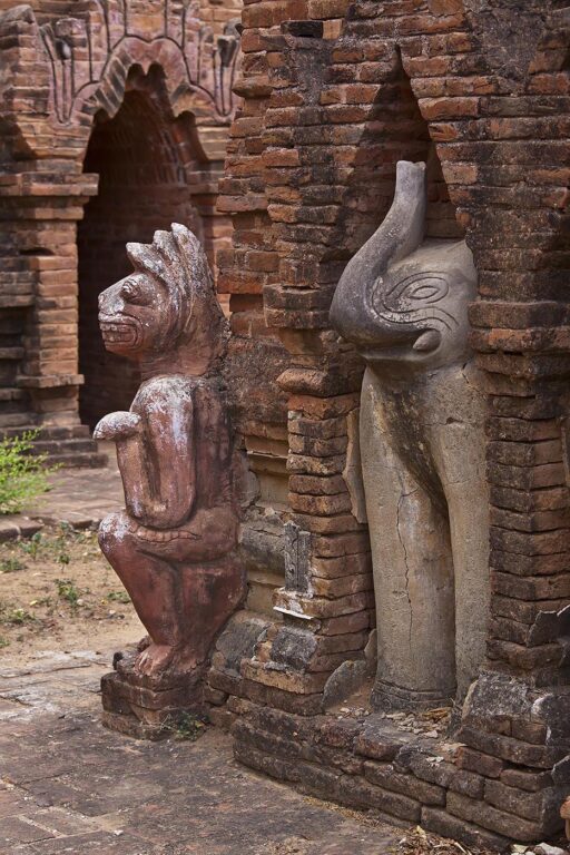 The rarely visited LAW KAHTIKEPAN temple complex boast an elephant and cat sculptures in an exterior nitch - BAGAN, MYANMAR