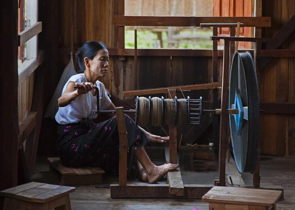 The weaving of LOTUS SILK fabric from the stalks of the lotus plant is a local industry of INLE LAKE - MYANMAR