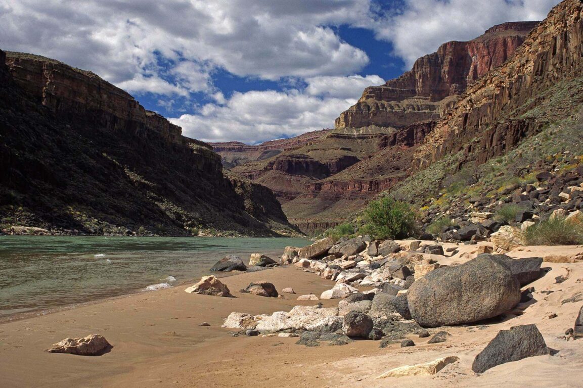 The mighty COLORADO RIVER has carved a 4500 foot deep canyon through 1.8 Billion years of rock - ARIZONA