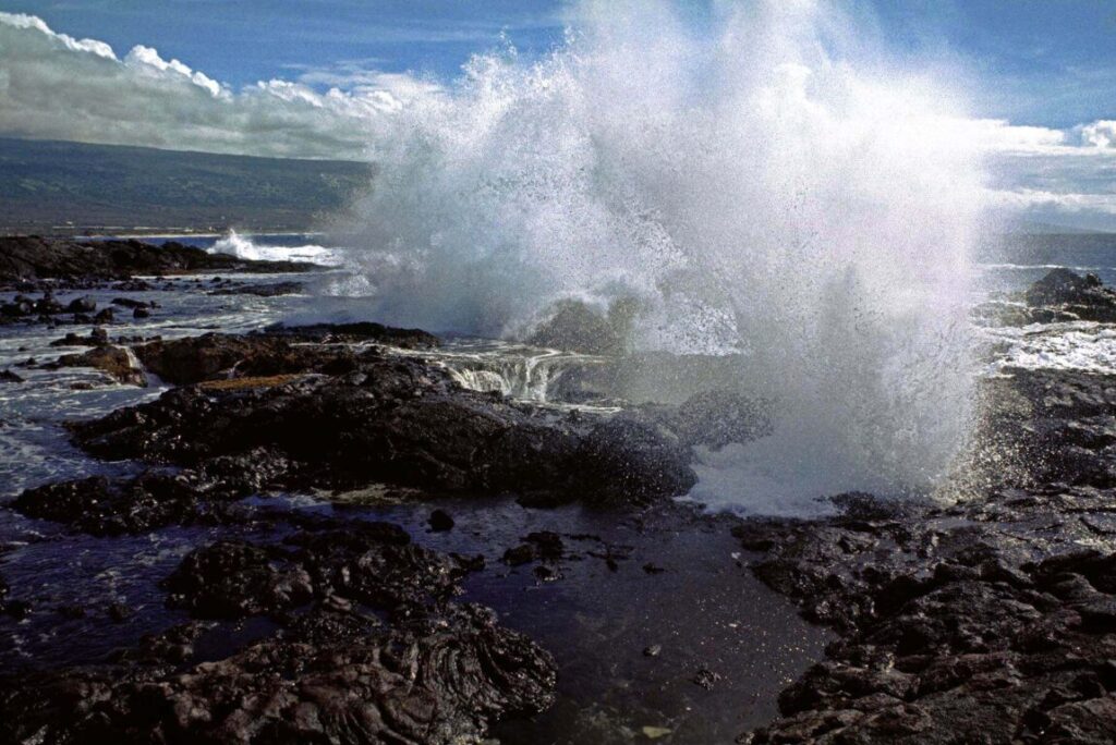 White SURF shooting out of a BLOWHOLE on the KONA COAST - HAWAII