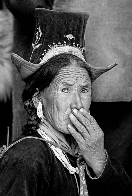Ladakhi woman reacts to the Cham dances at TIKSE MONSATERY - LADAKH, INDIA - 1989