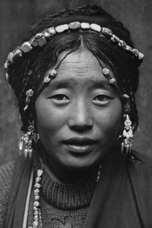 Tibetan beauty with elaborate tourquoise headdress - Barkhor,Lhasa