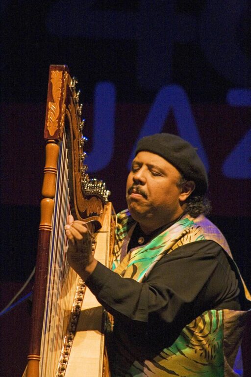 Carlos Reyes preforms on the harp  with John Handy and the 40th Anniversary Quintet at the MONTEREY JAZZ FESTIVAL