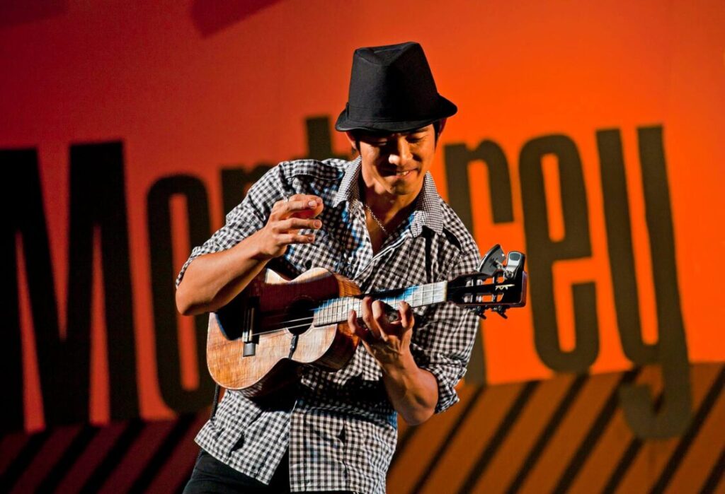 JAKE SHIMABUKURO plays guitar and sings on the Garden Stage - 2010 MONTEREY JAZZ FESTIVAL, CALIFORNIA