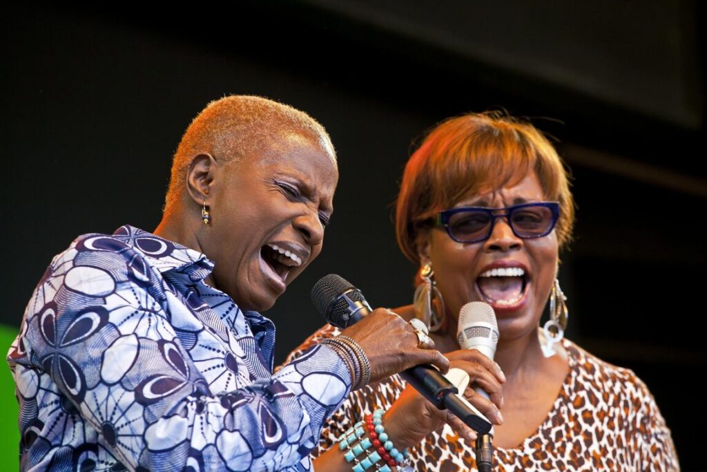 ANGELIQUE KIDJO sings a duet with DIANNE REEVES on the Jimmy Lyons Stage - 2010 MONTEREY JAZZ FESTIVAL, CALIFORNIA